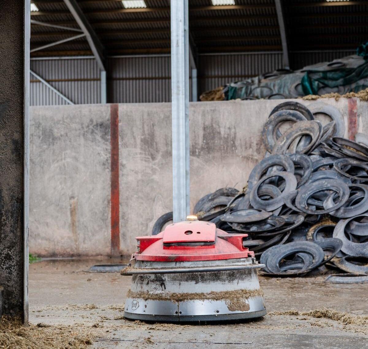 Specialist farm machinery inside a working building, representing plant, equipment and specialist risks covered by tailored insurance